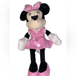 Minnie Mouse 16” plush toy, wearing a pink dress w/ white polka & matching bow.